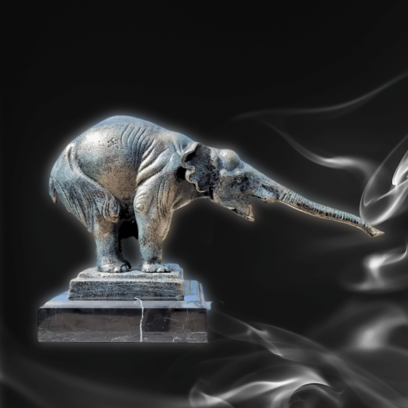Cast iron Elephant statue on marble pedestal