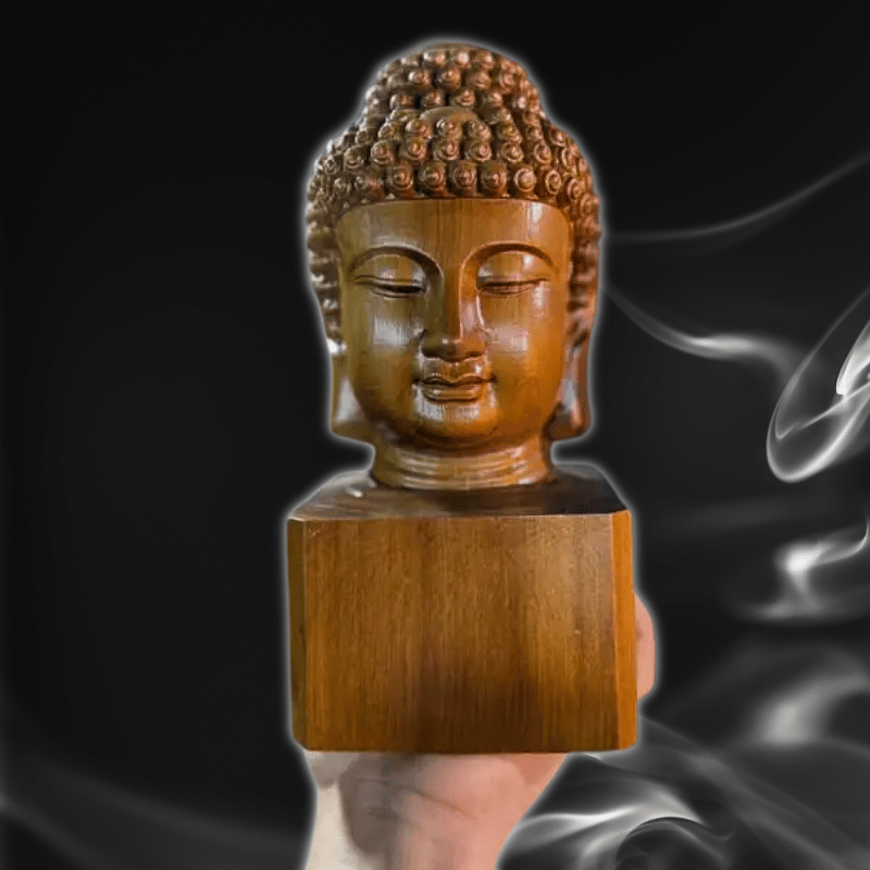 Buddha head statue in cypress wood