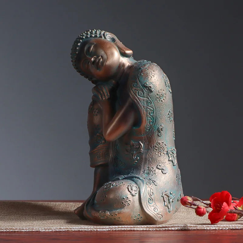 Sleeping Buddha statue in resin